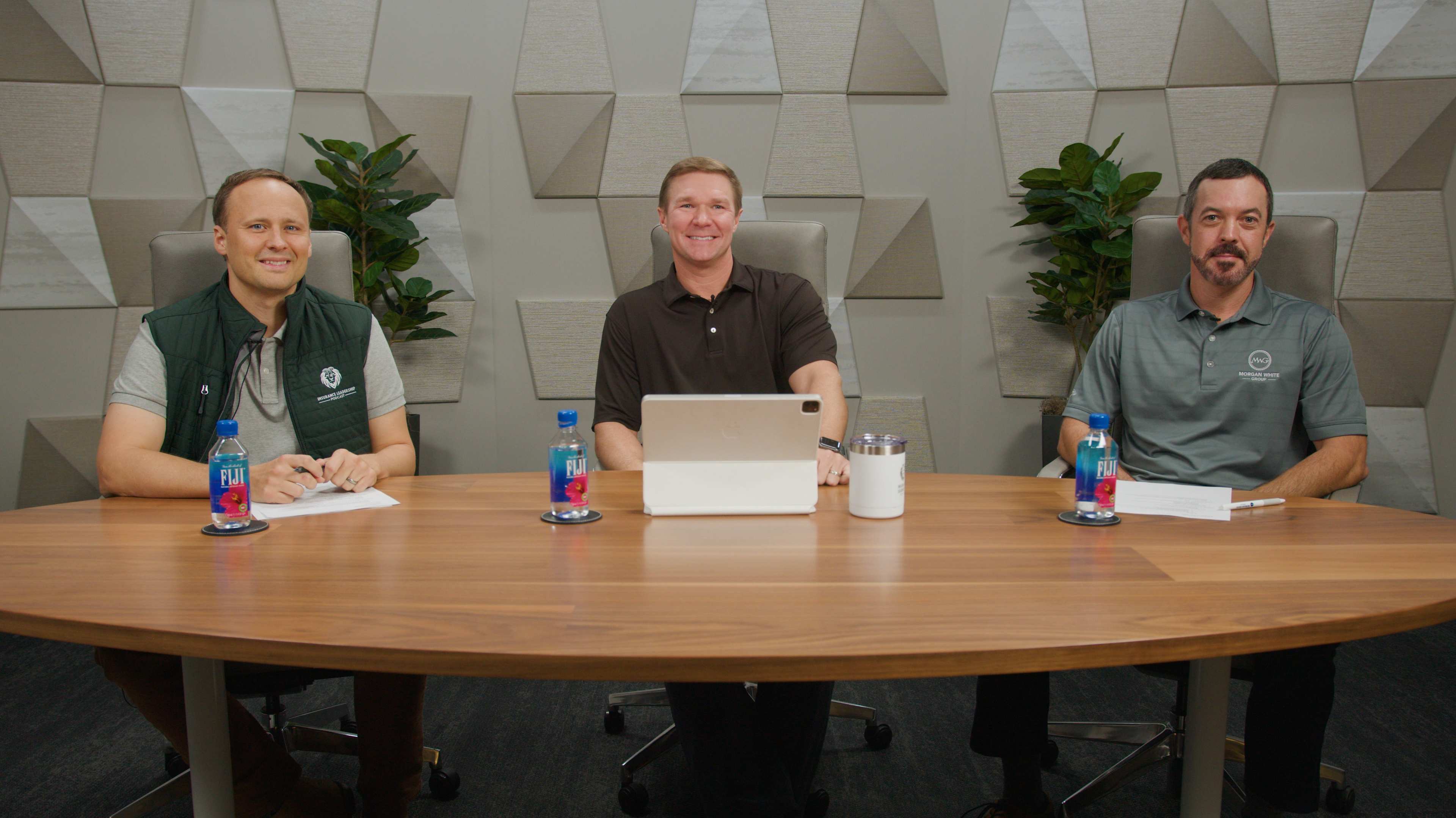 Casey Combest, Ryan Eaton, and Ben Markland sitting at a table